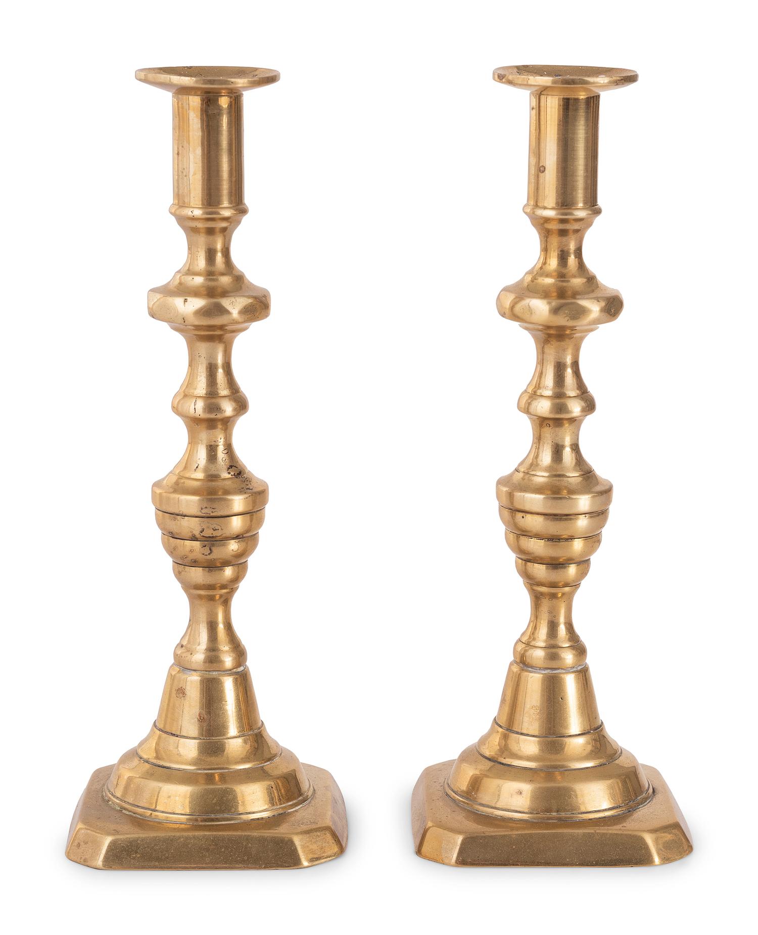 A Pair of Brass Candlesticks