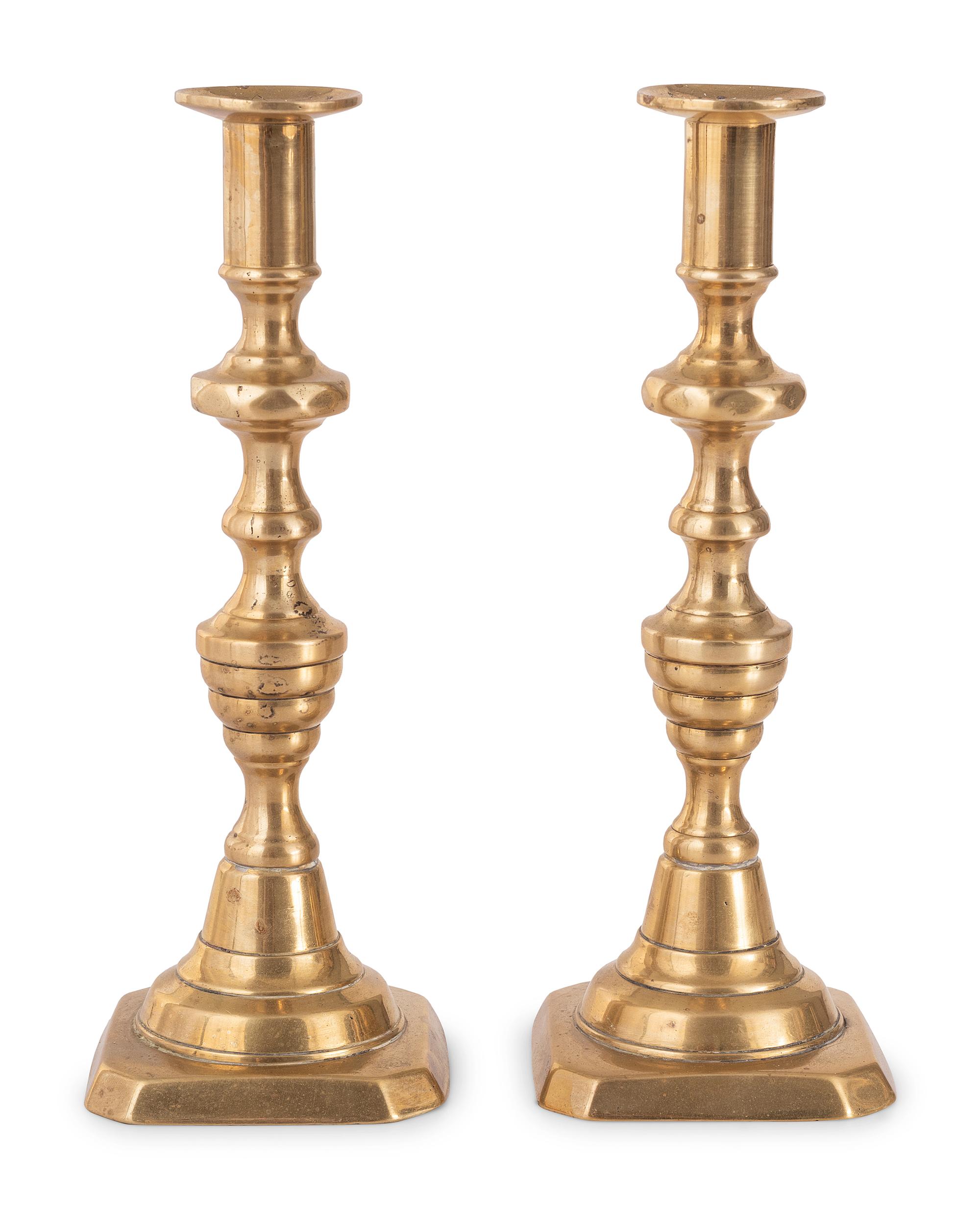 A Pair of Brass Candlesticks