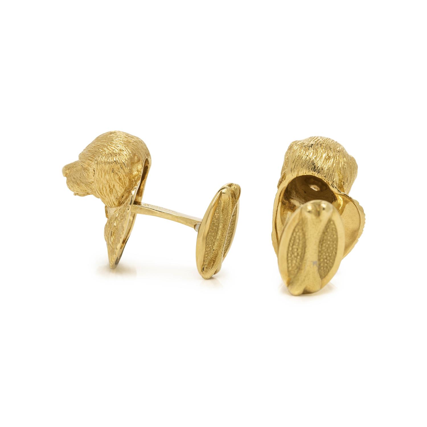 TIFFANY & CO., YELLOW GOLD AND SAPPHIRE DOG CUFFLINKS