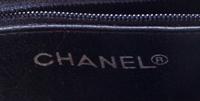 A Chanel Navy Quilted Leather Tote Handbag, 12" x 8" x 2"; Strap drop: 7".