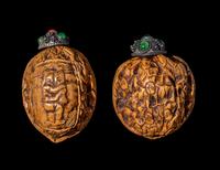 A Pair of Chinese Carved Walnut Snuff Bottles