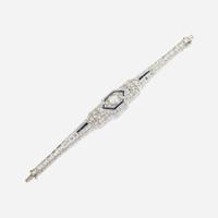 An Art Deco diamond, sapphire, and platinum bracelet