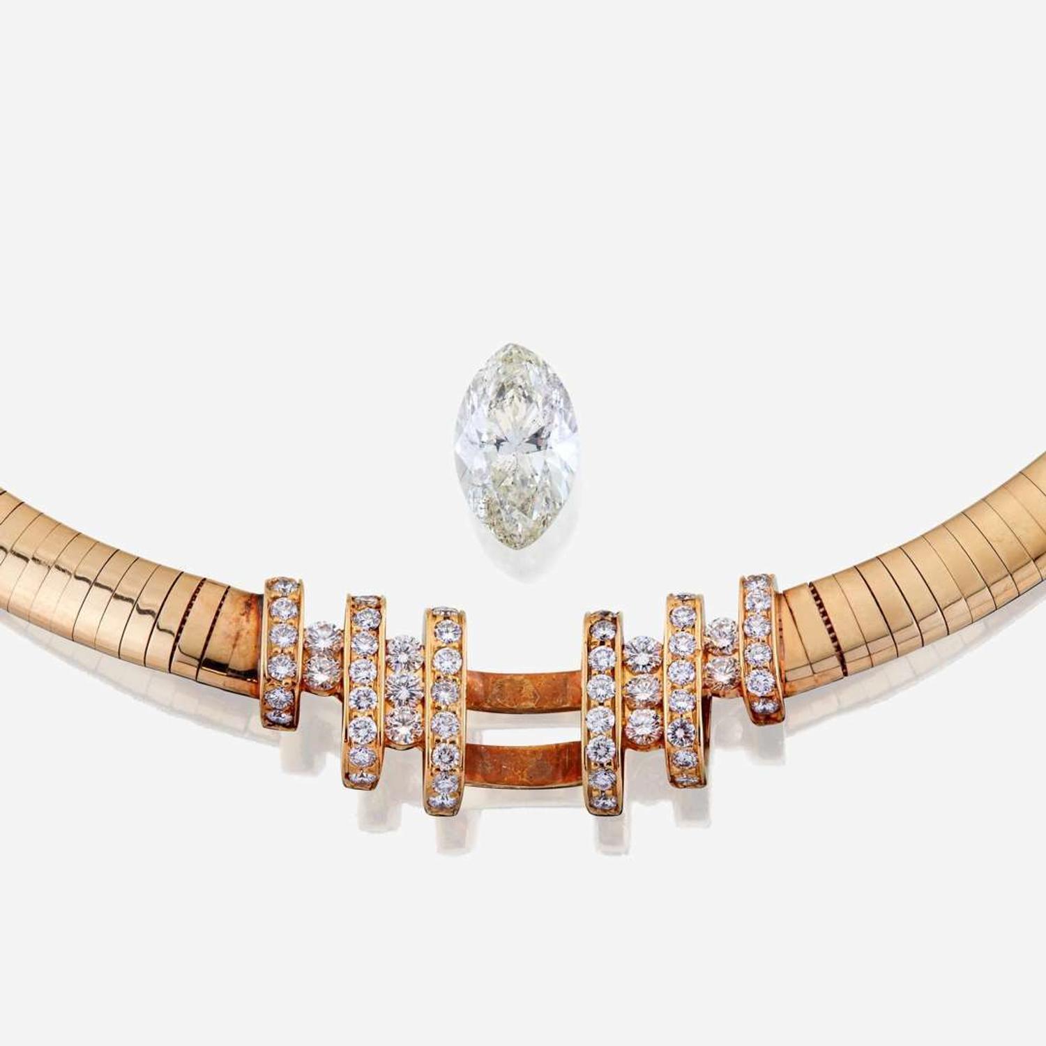 A diamond, eighteen karat gold, and fourteen karat gold necklace