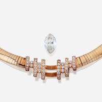 A diamond, eighteen karat gold, and fourteen karat gold necklace