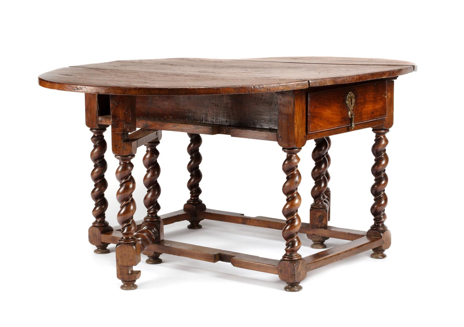 A William and Mary Walnut Drop-Leaf Table Height 30 1/2 x width 30 x depth 52 1/2 inches. — 18TH CENTURY