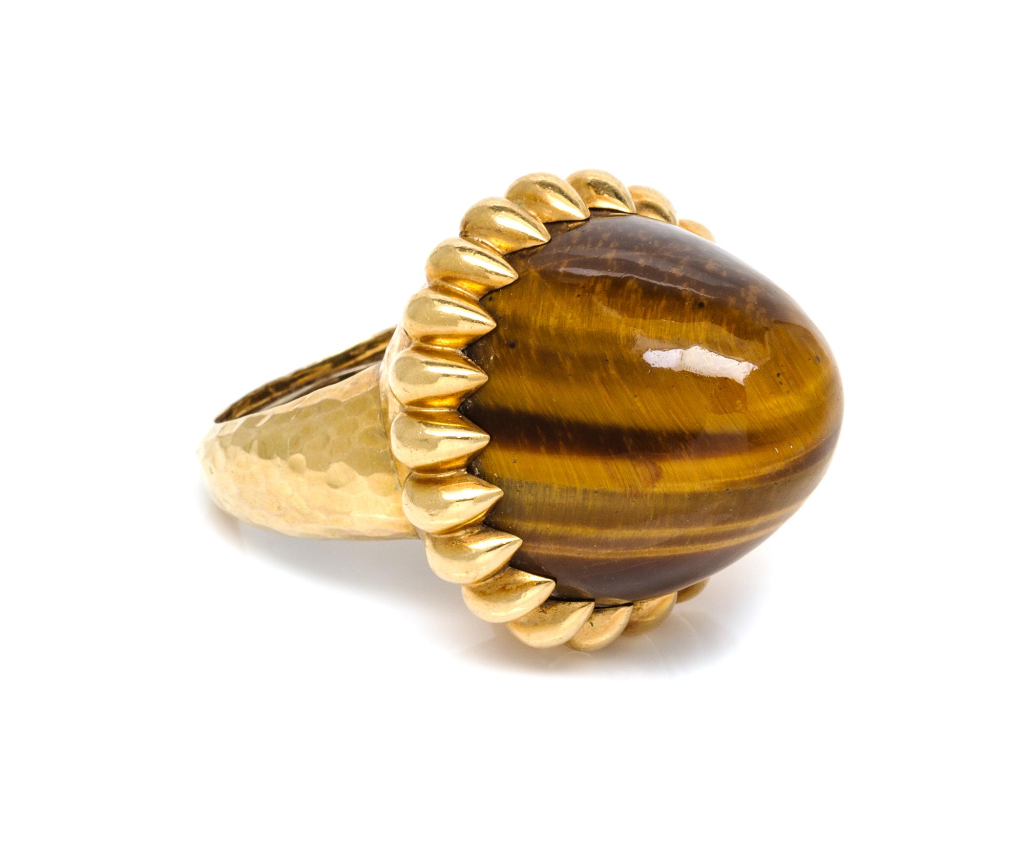 An 18 Karat Yellow Gold and Tiger's Eye Bombe Ring, C. Vollrath, 22.30 dwts.
