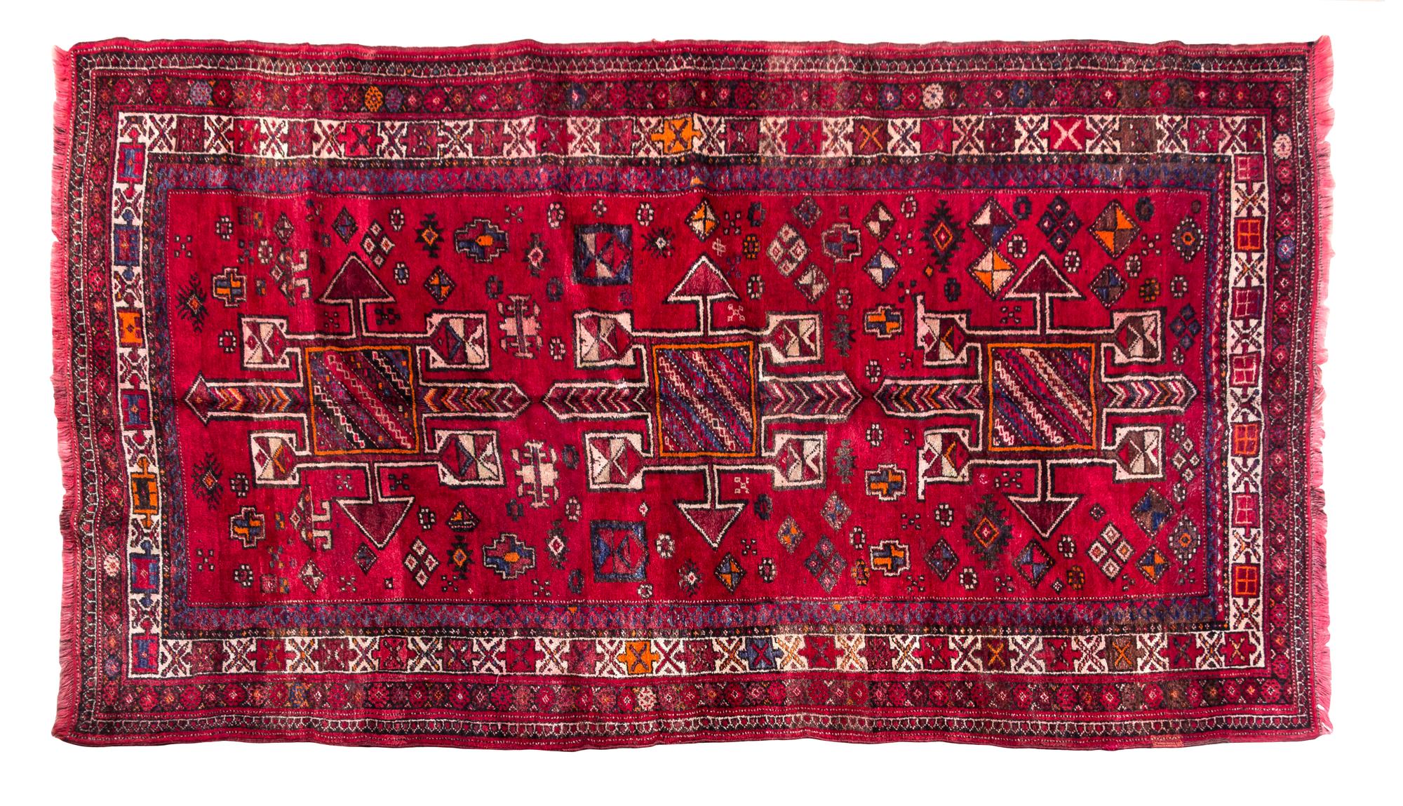 A Kordi Wool Rug 8 feet 2 inches x 4 feet 6 inches.