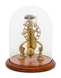 An English Brass Fusee Skeleton Clock and Cloche