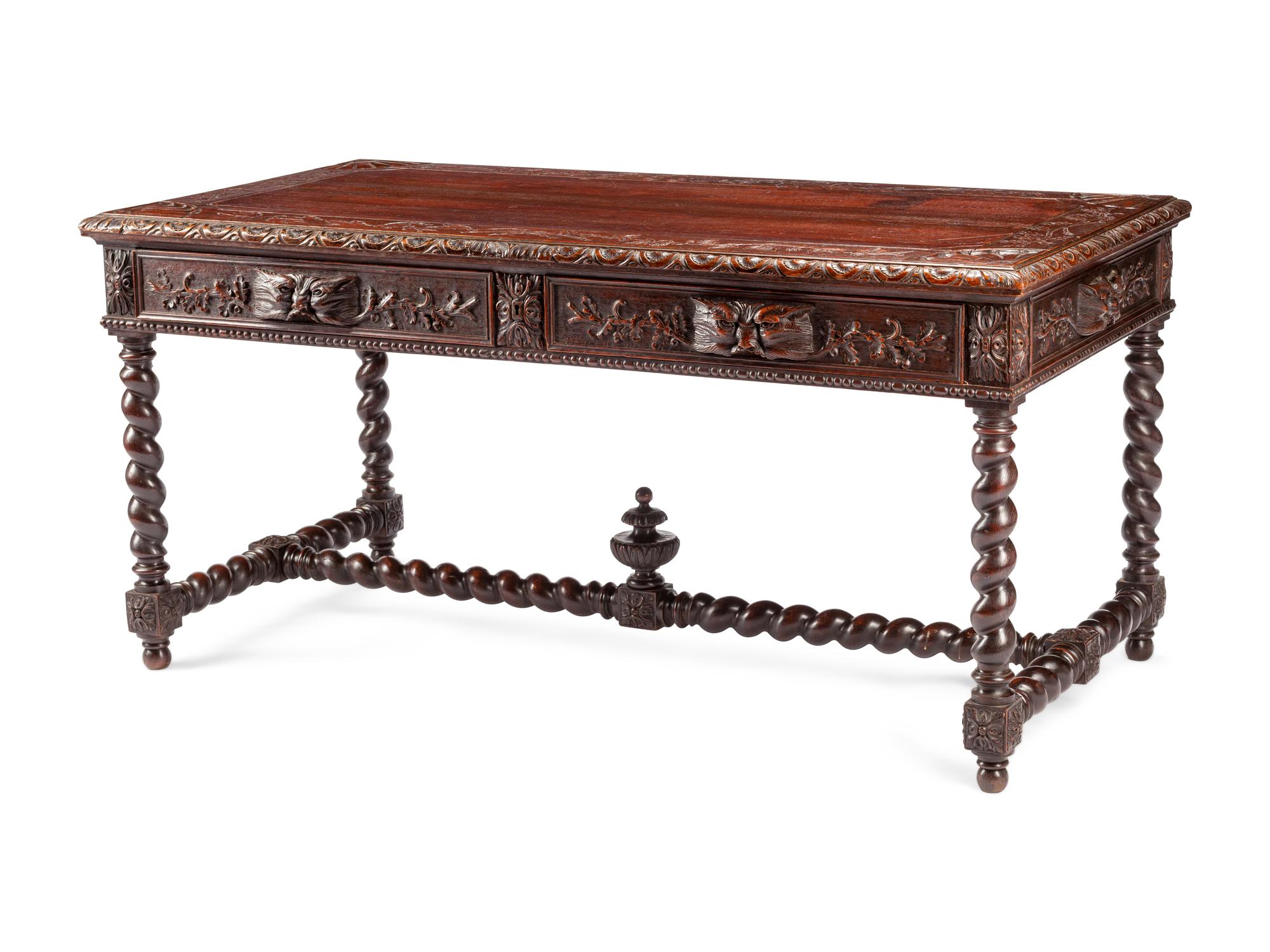 A French Renaissance Revival Carved Oak Library Table