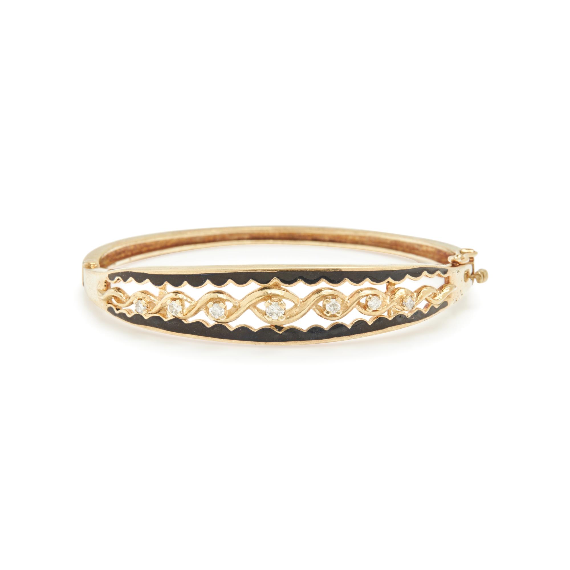 COLLECTION OF YELLOW GOLD AND DIAMOND BANGLE BRACELETS