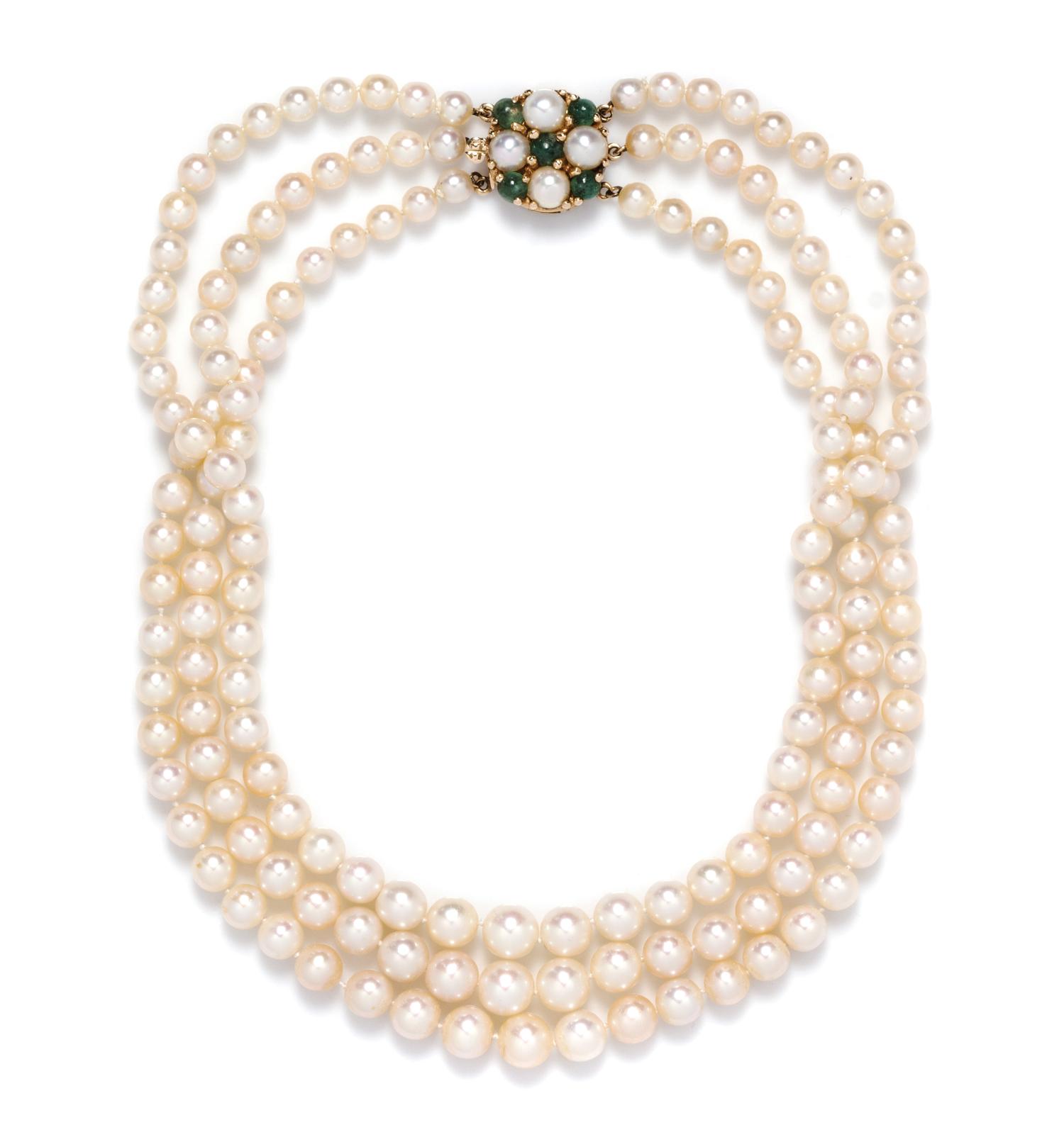 A Graduated Triple Strand Natural Pearl Necklace,