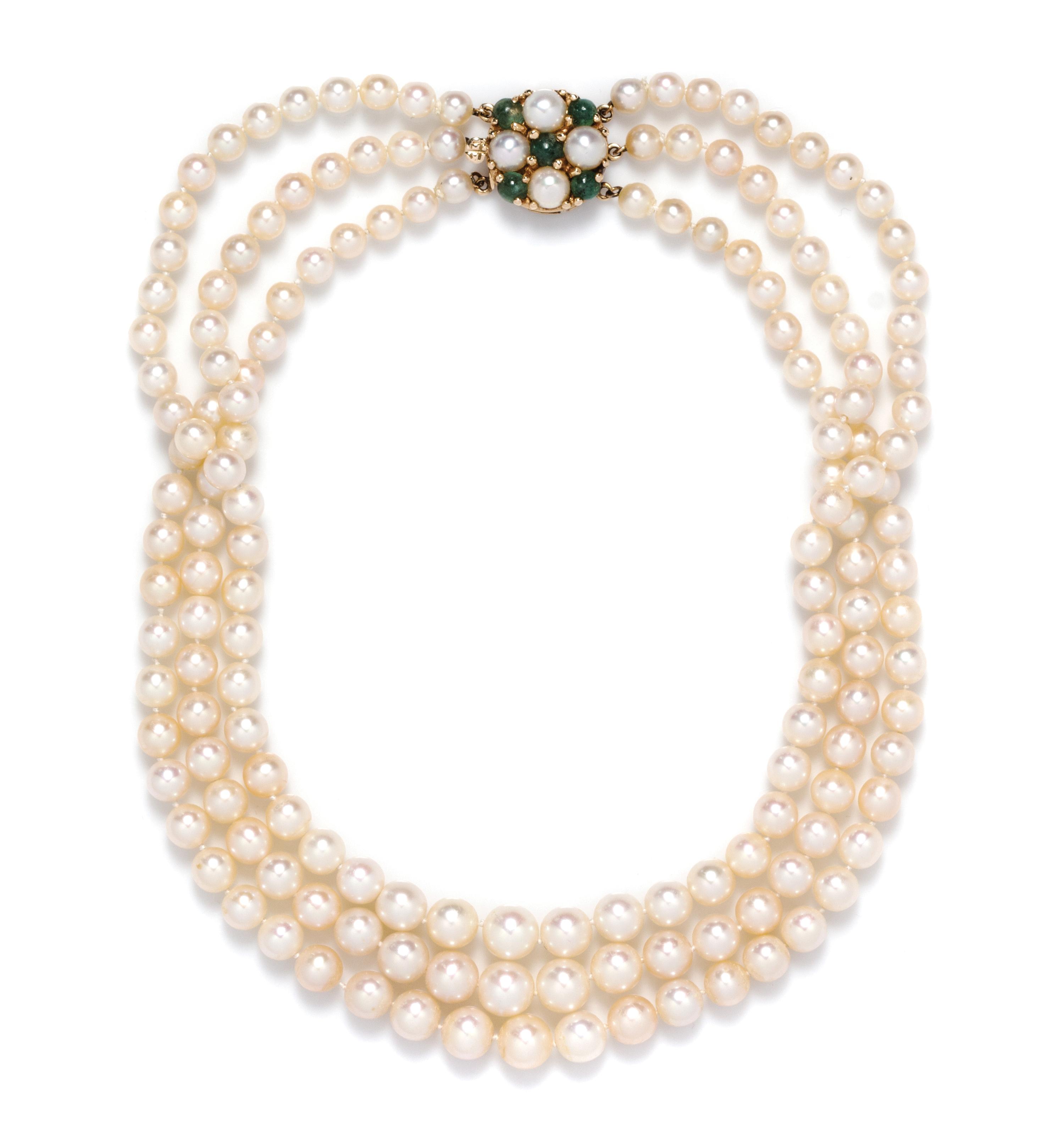 A Graduated Triple Strand Natural Pearl Necklace,