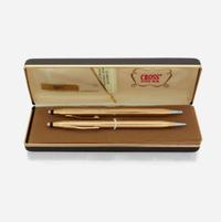 A gold pen and pencil set, Cross