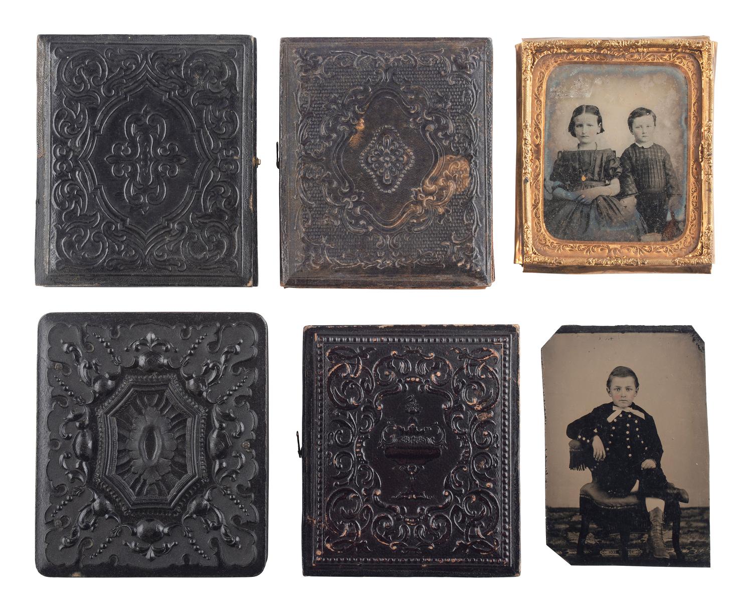 [EARLY PHOTOGRAPHY]. A group of 19 ambrotypes and tintypes of children of varying ages, some posed with their parents, incl. African American infant and pairs of images taken during the same sitting.