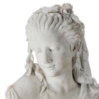 An Italian Carved Marble Bust of a Woman on an Associated Pedestal