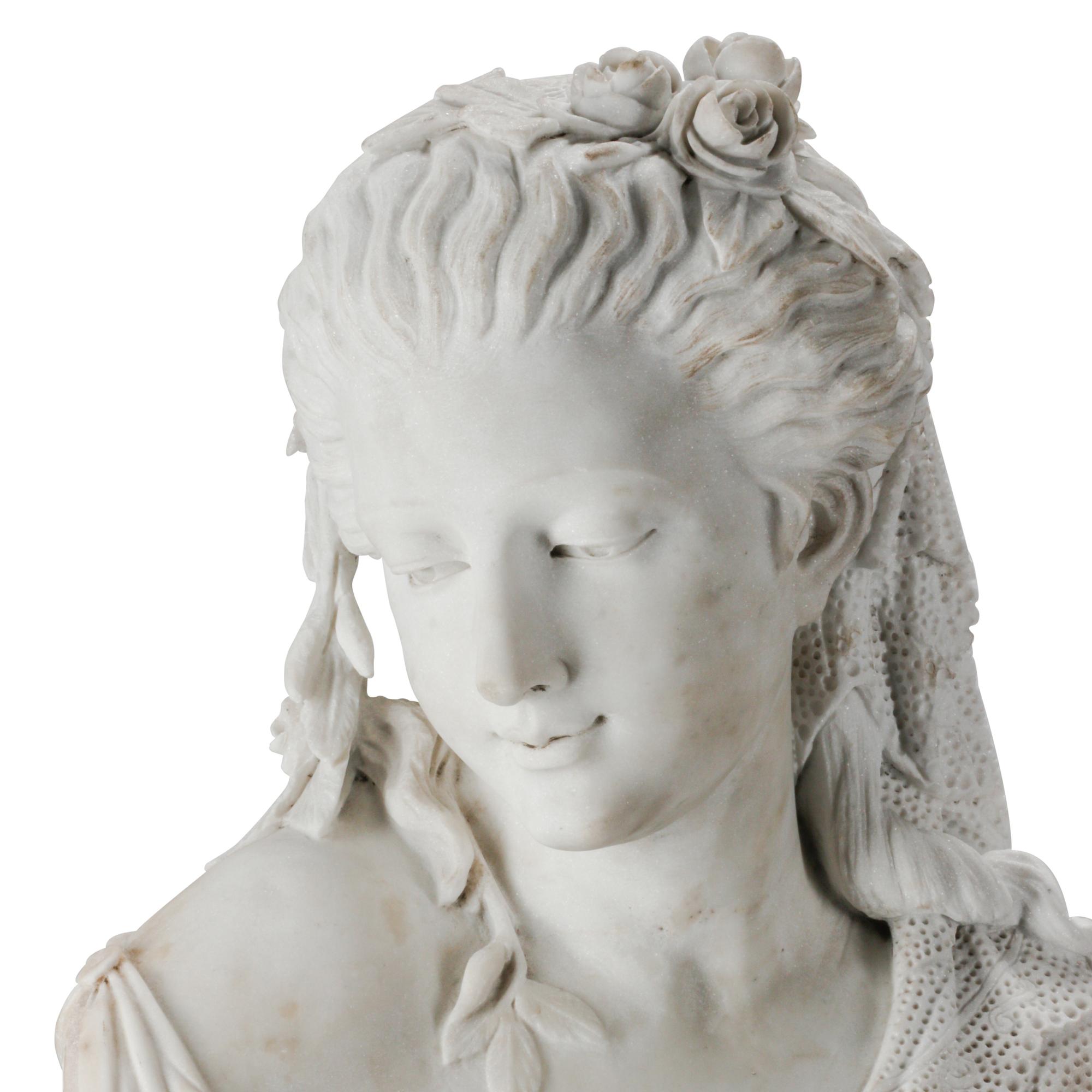 An Italian Carved Marble Bust of a Woman on an Associated Pedestal
