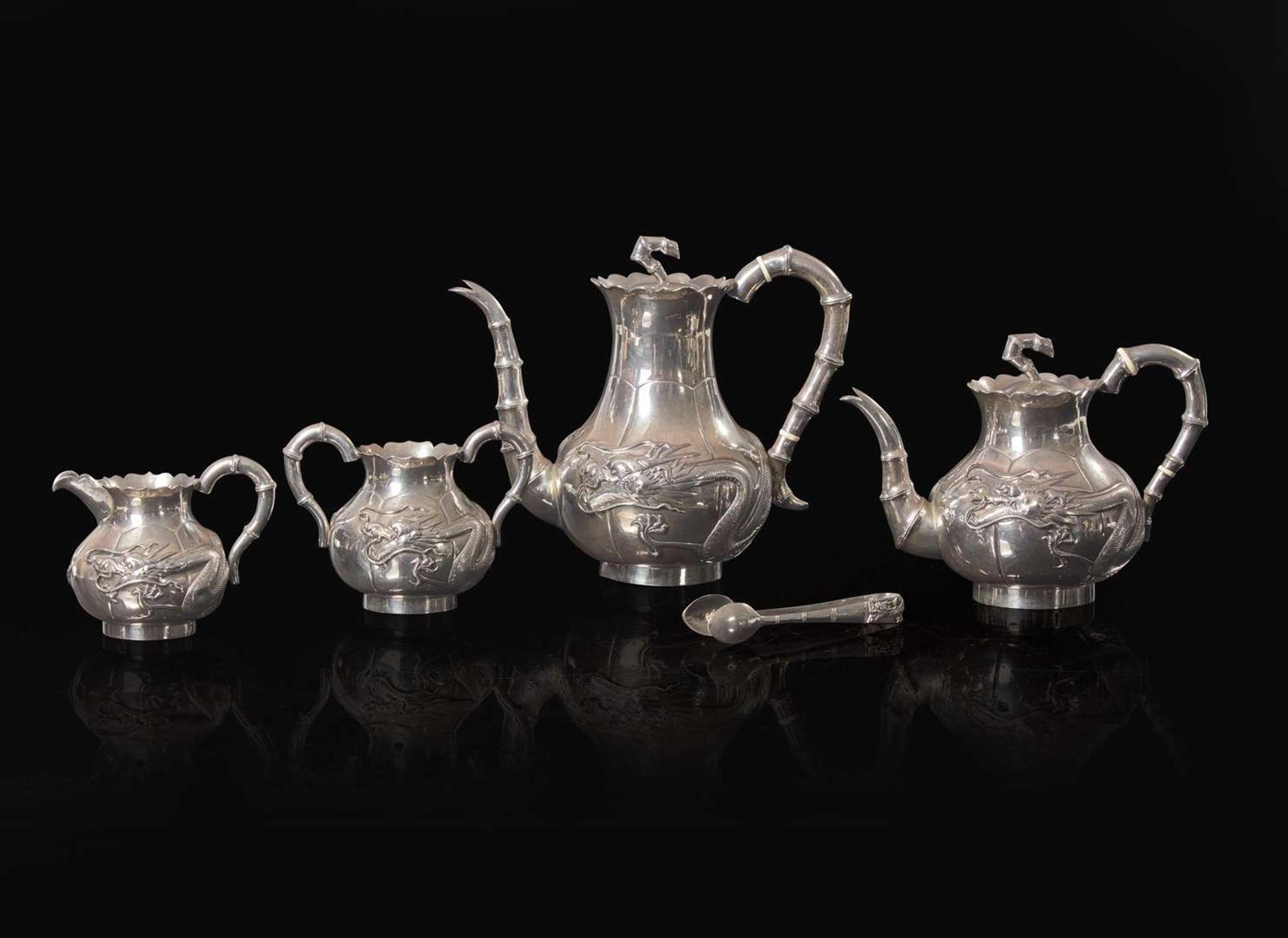 A Chinese export silver five-piece "Dragon" tea and coffee service and tongs, mark of Zeewo, Shanghai, late 19th to early 20th century 一組五件銀質咖啡器及茶具 Zeewo款 上海 十九世紀末至二十世紀初