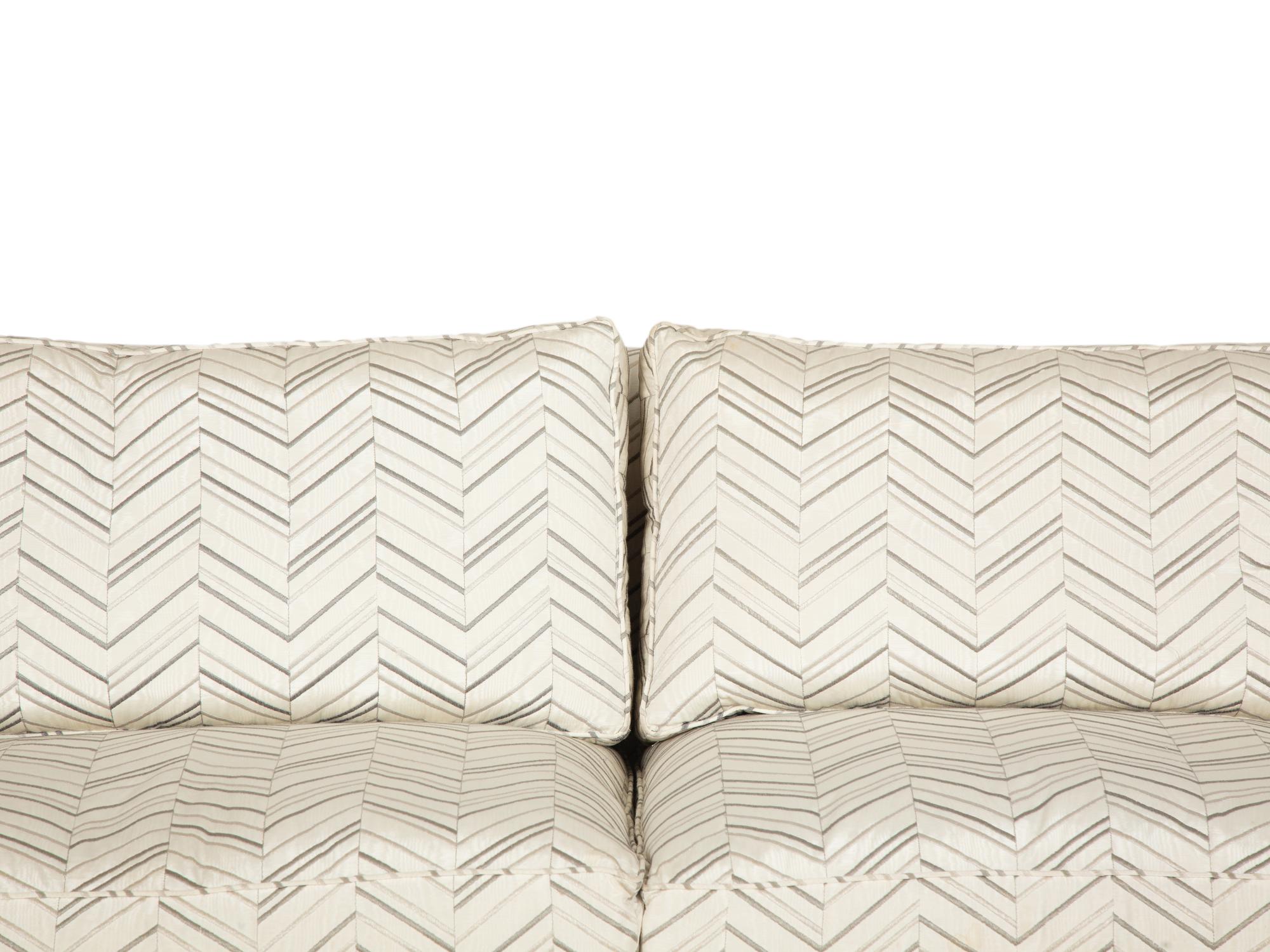 A Pair of Contemporary French Chevron Patterned Upholstered Sofas