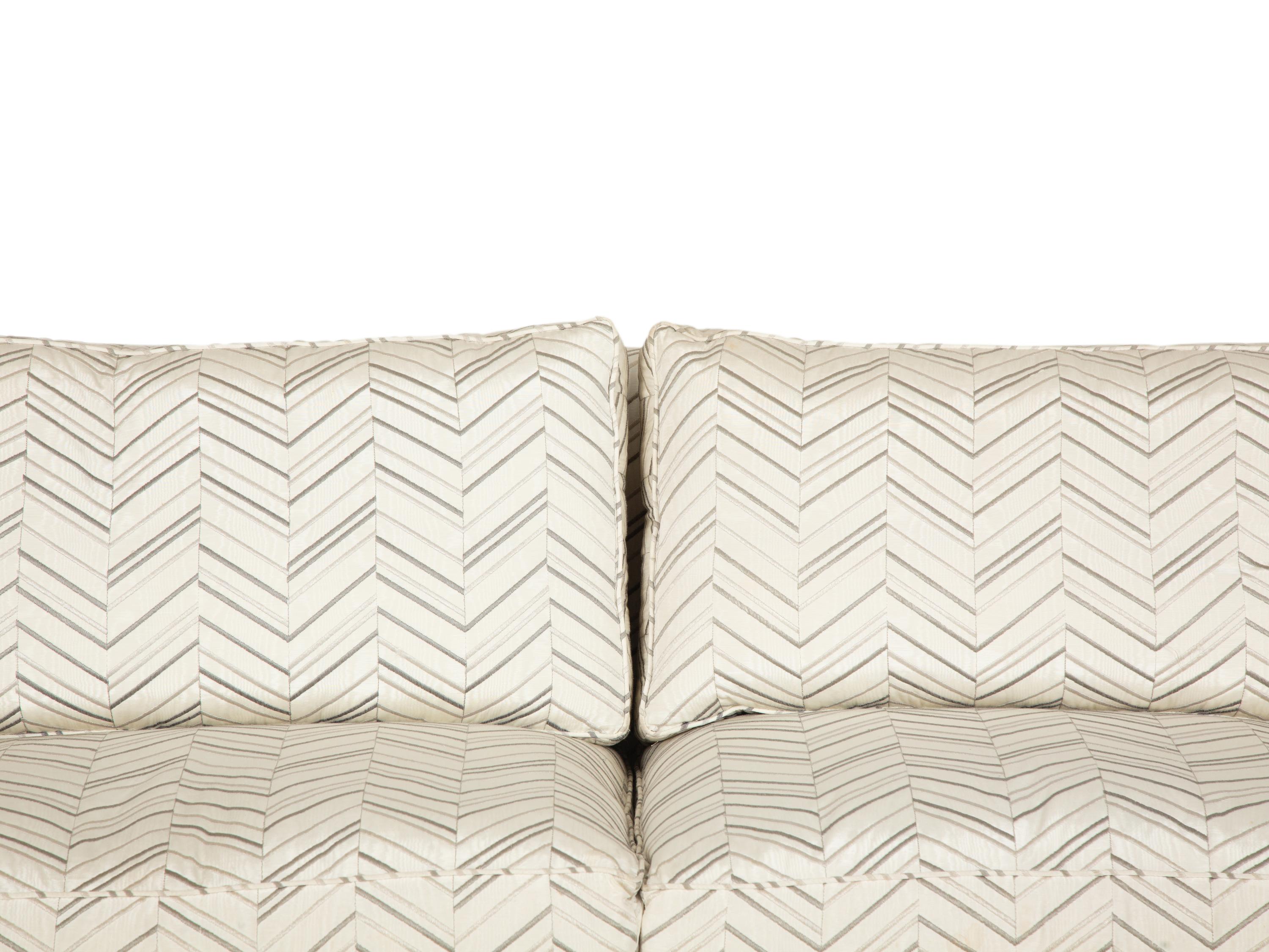 A Pair of Contemporary French Chevron Patterned Upholstered Sofas