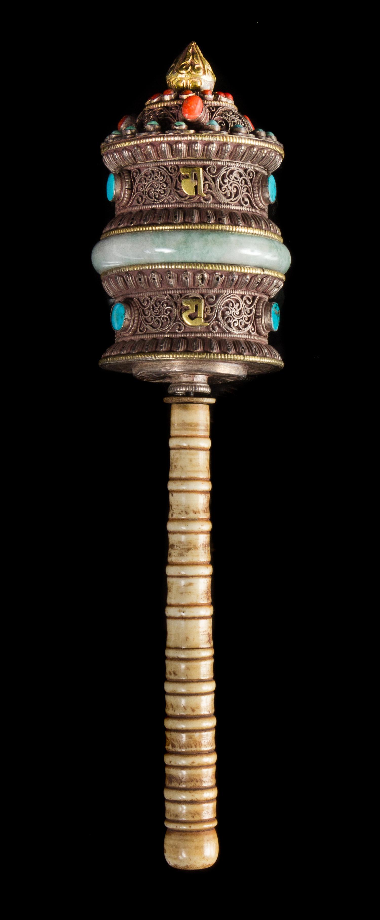 A Tibetan Hardstone and Bone Inset Gilt Metal Prayer Wheel