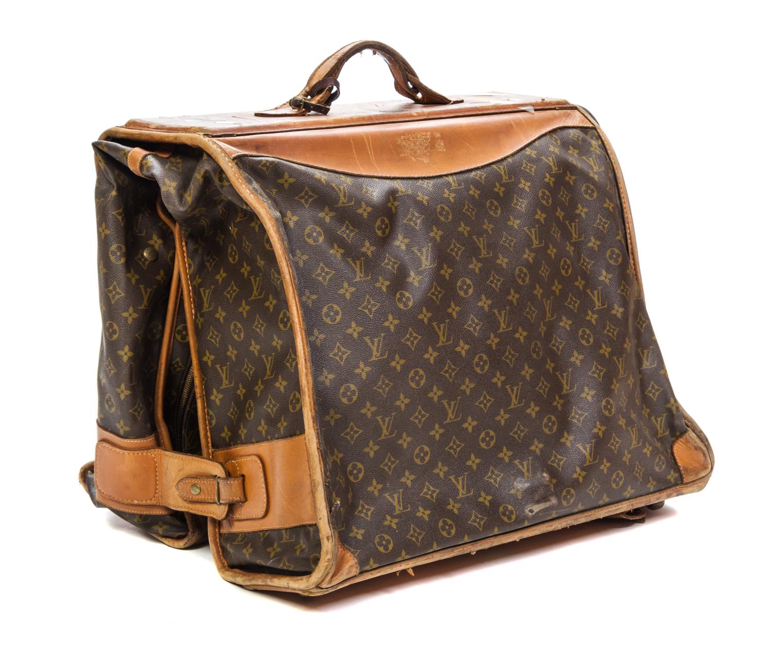 A Louis Vuitton Monogram Canvas Soft-sided Suitcase and Folding Garment Bag, 29 1/2 x 20 x 9 inches.
