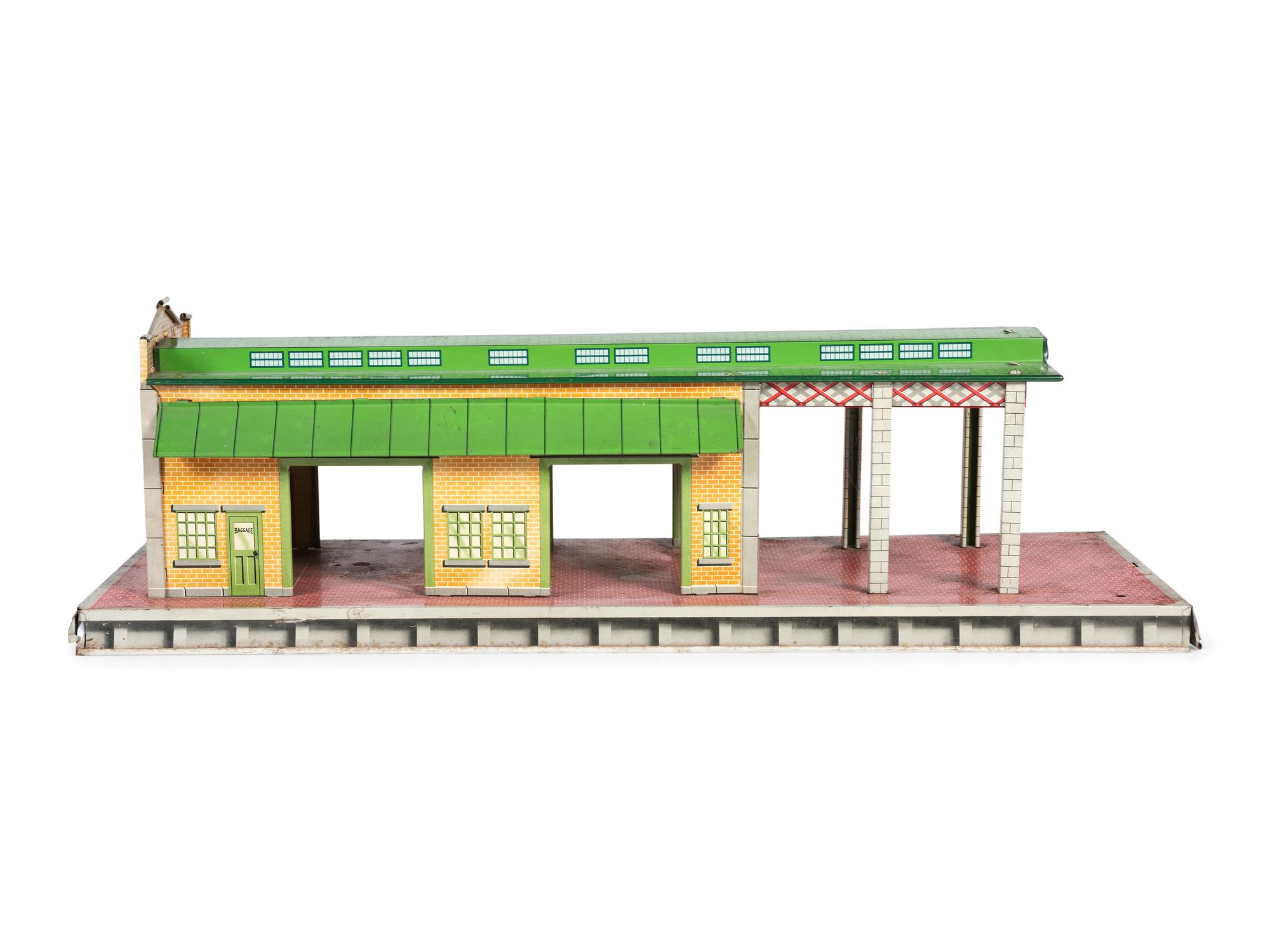 A Group of Toy Service Stations and Cars