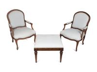 A Pair of Louis XV Style Fauteuils and an Associated Stool