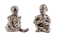 A Pair of Victorian Silver Figural Condiment Containers, Thomas Johnston II, London, 1886, each in the form of a seated child, one laug