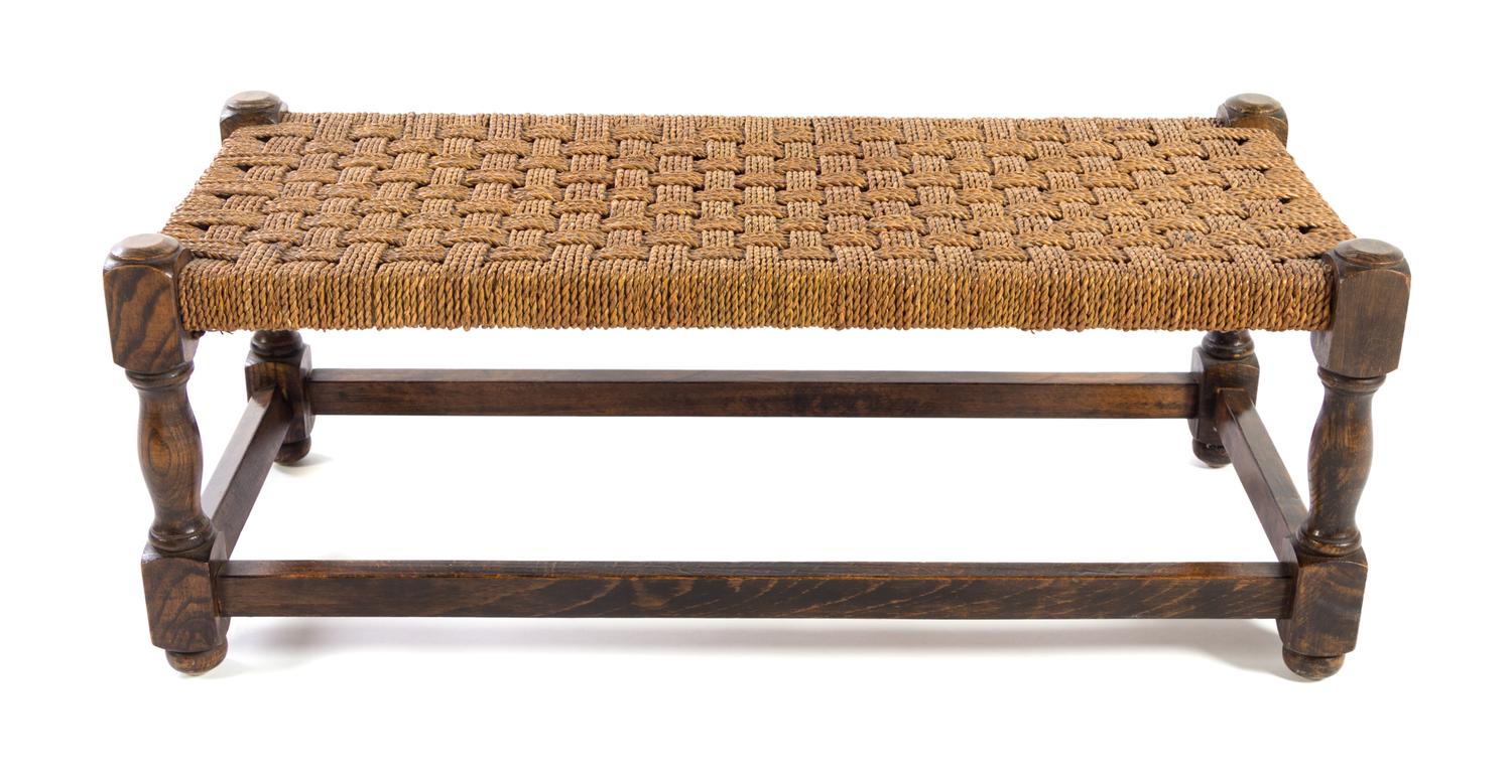 An Oak Bench Height 11 3/4 x width 30 1/4 x depth 13 1/4 inches.