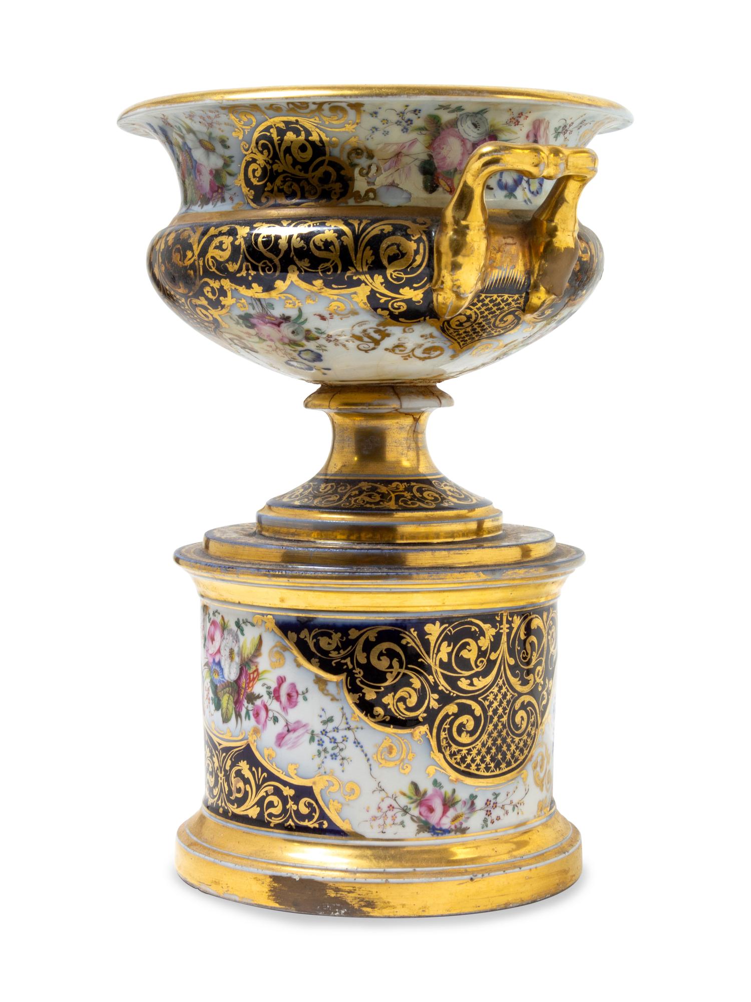 An English Parcel Gilt and Painted Porcelain Pedestal Bowl