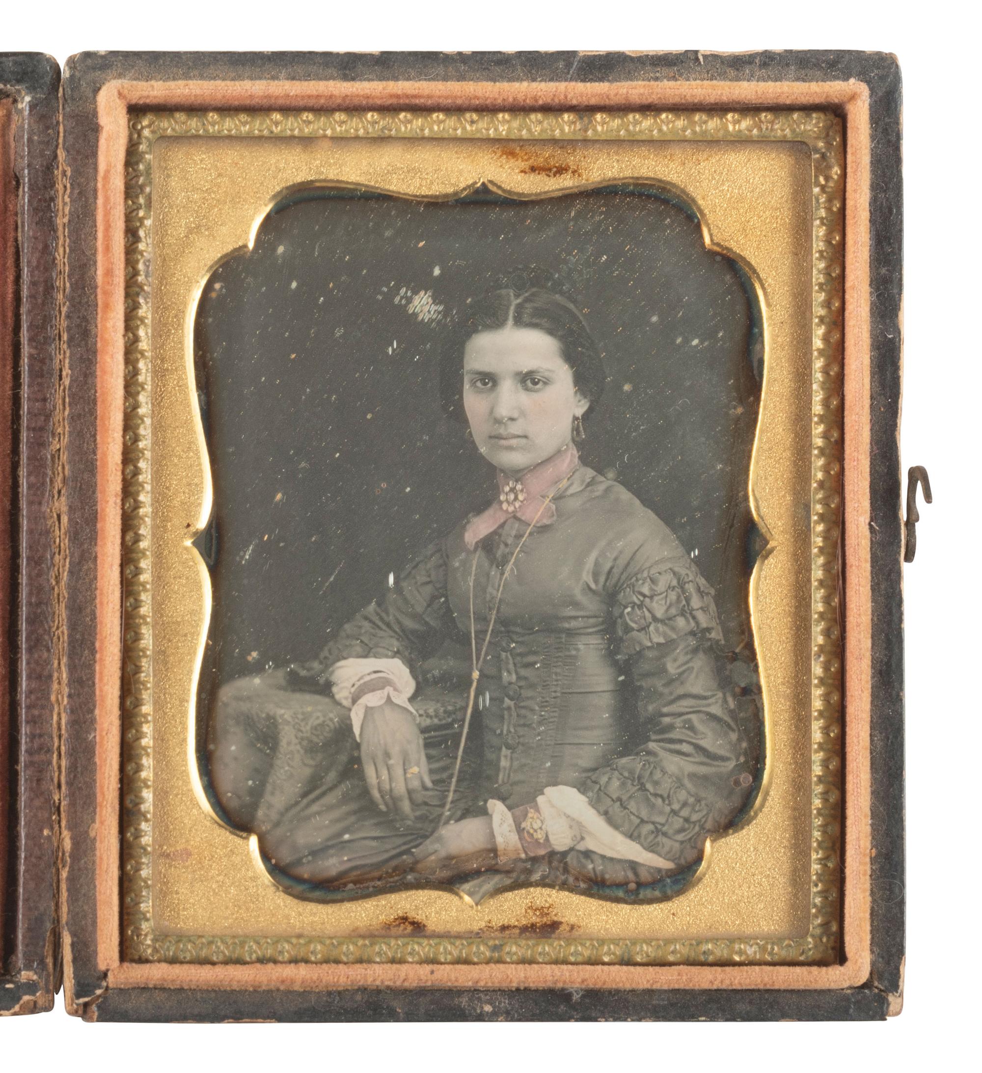 [EARLY PHOTOGRAPHY]. Sixth plate daguerreotype of an elegant woman, possibly of Hispanic heritage.