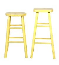 Two Yellow Painted Stools Height of tallest 29 1/2 inches.