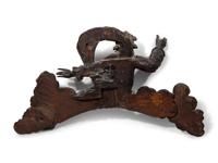 A Continental Carved Figural Ornament