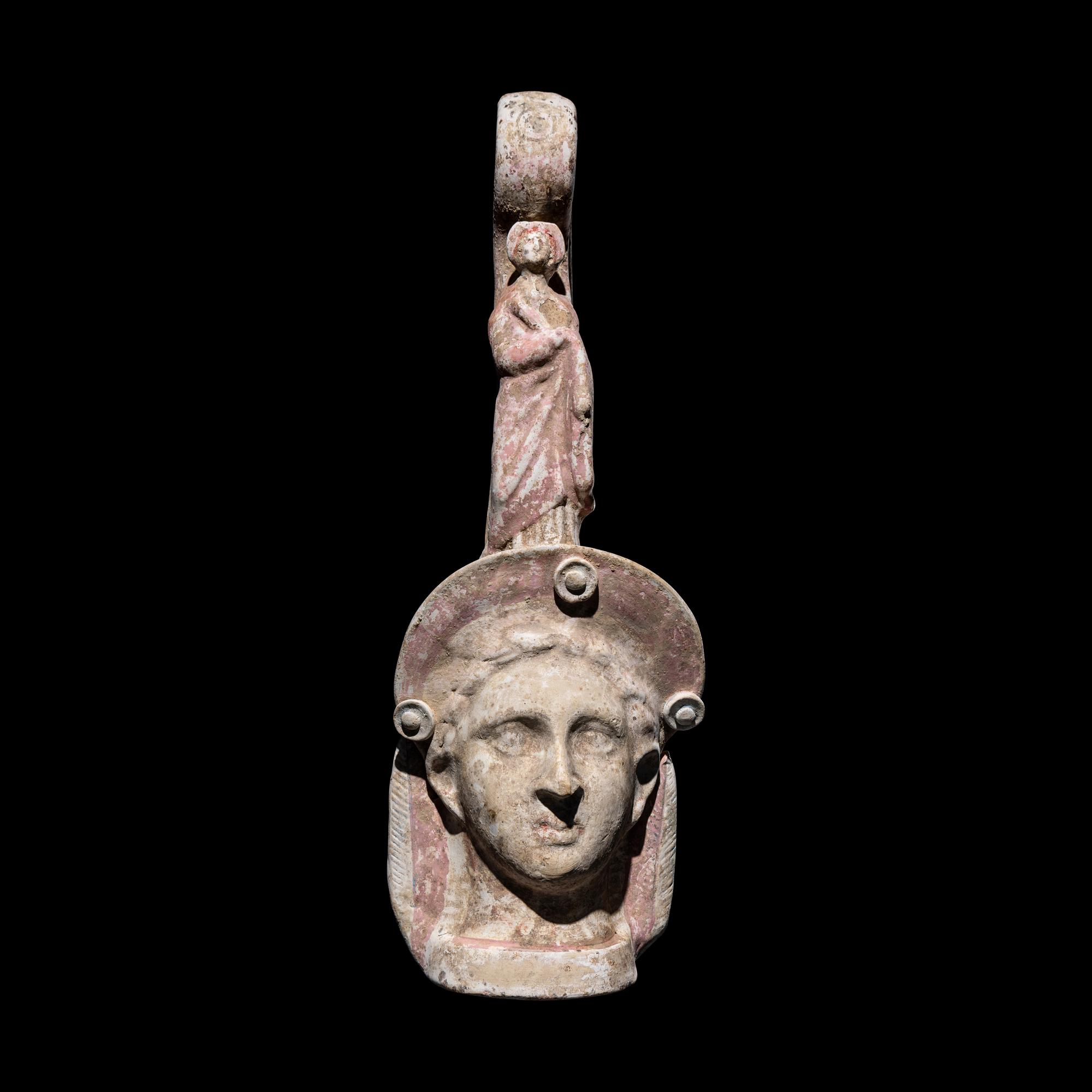 A Canosan Painted Terracotta Figural Oinochoe