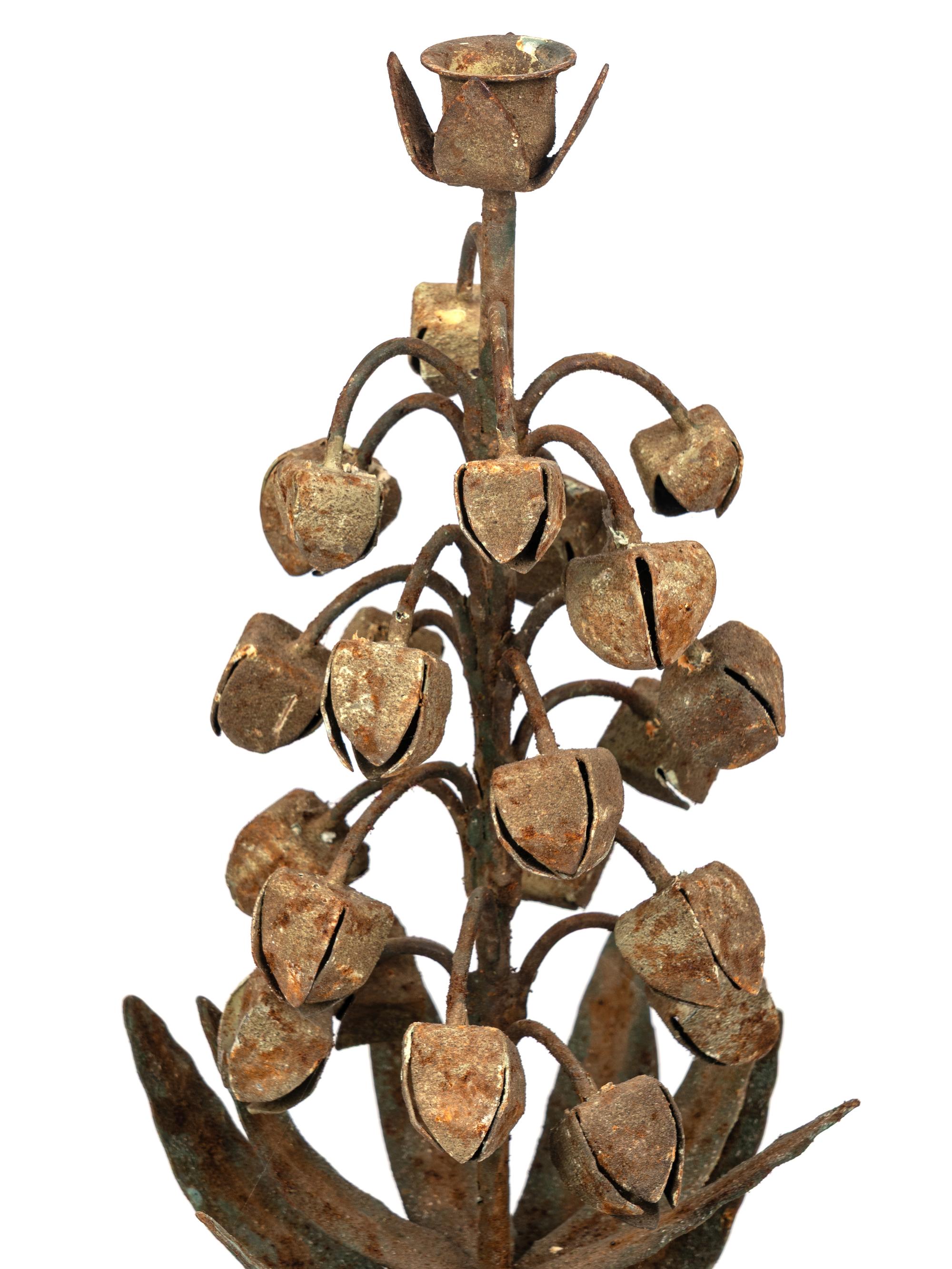 A Set of Four Topiary-Form Candlesticks