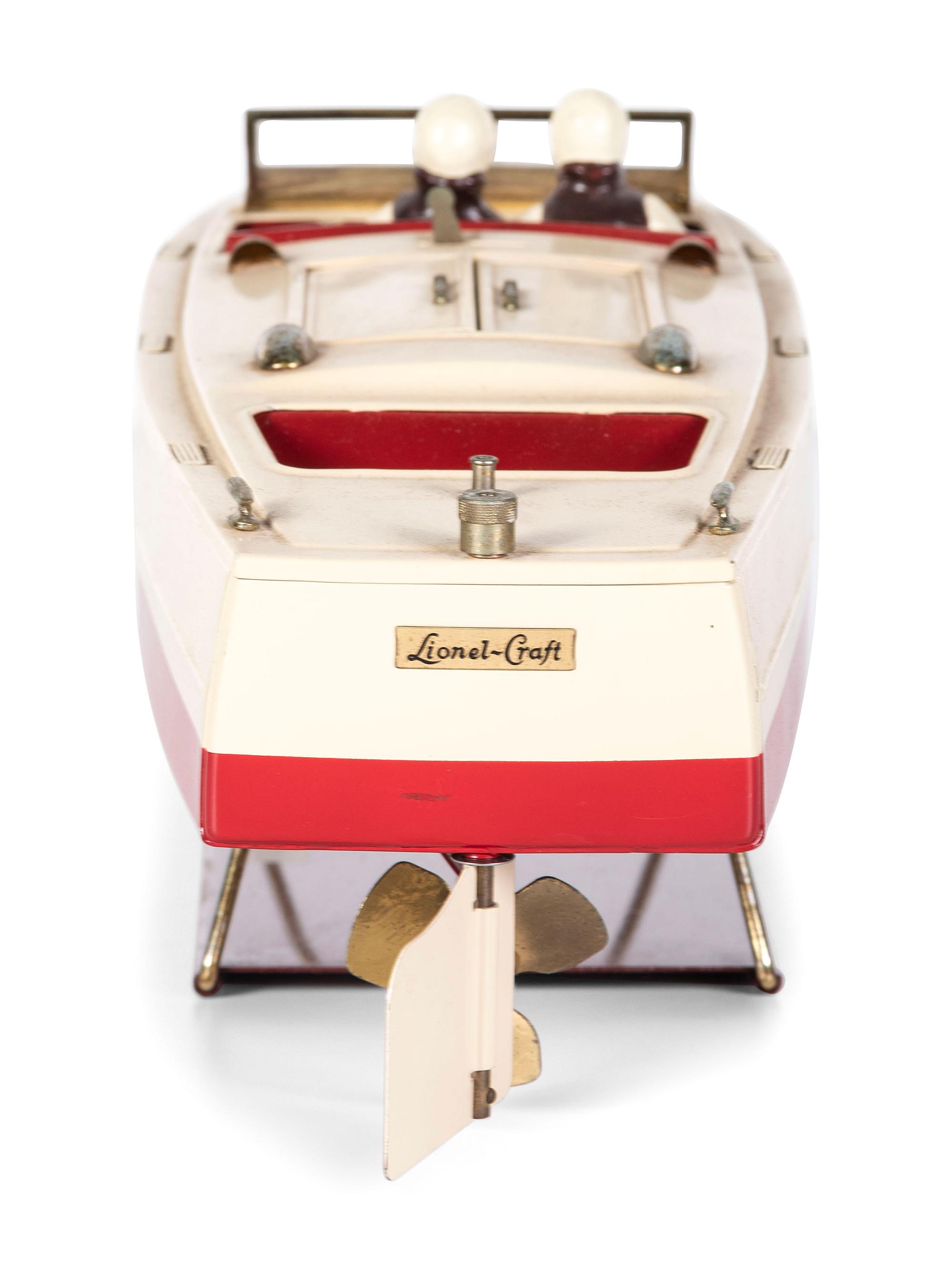 A Lionel Craft Wind Up Tin Boat