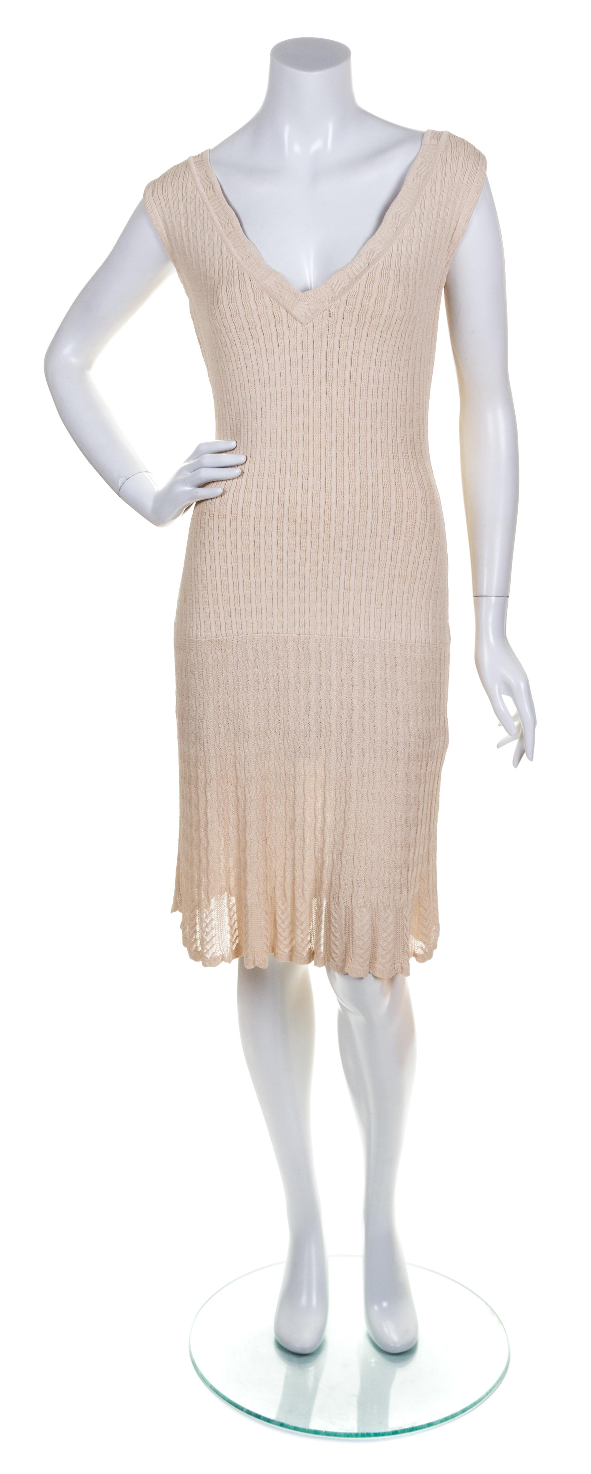 An Alaia Cream Ribbed Knit Dress, Size L.
