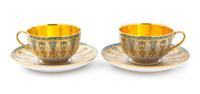 Two French Porcelain Cups and Saucers Diameter of saucers 7 1/4 inches.