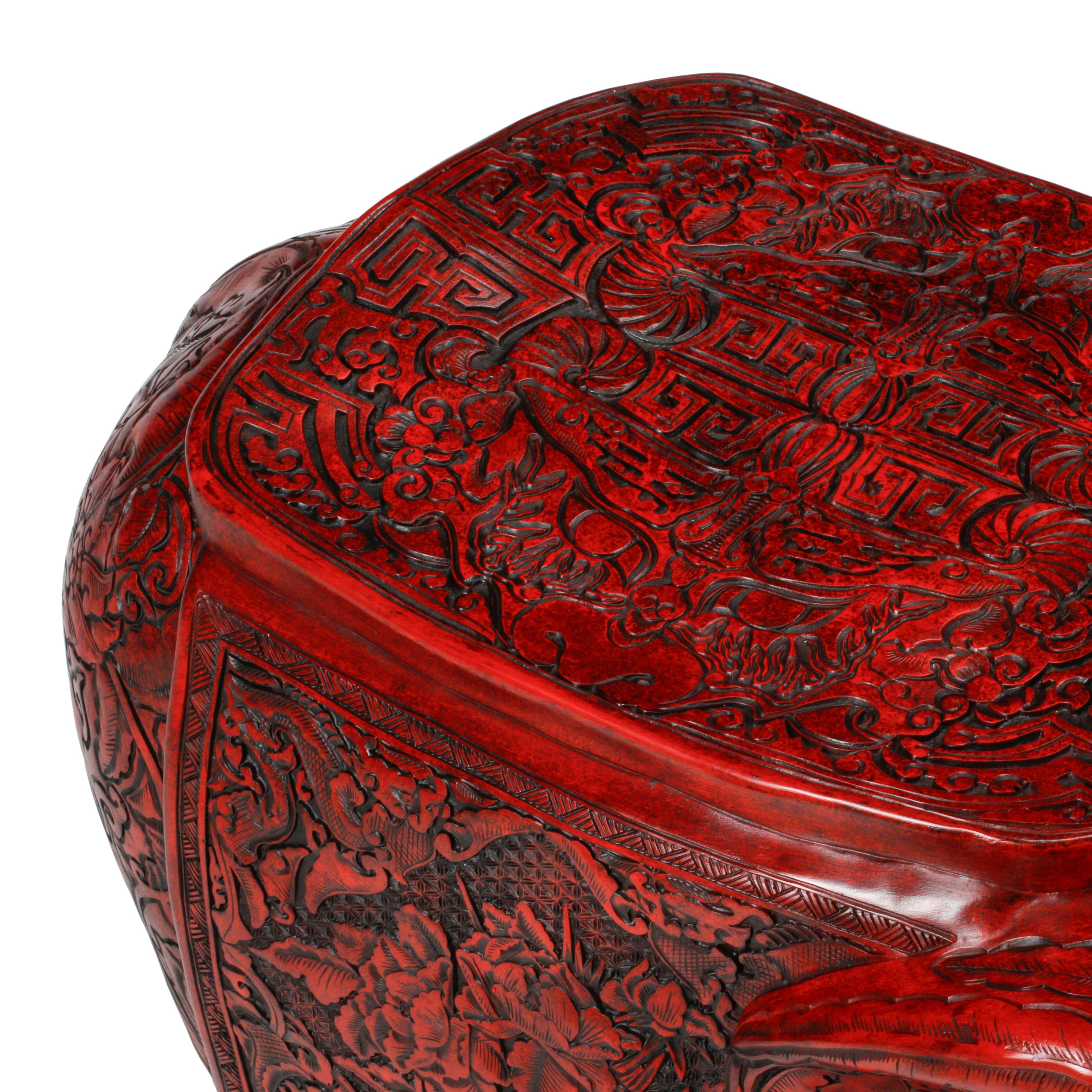 A Pair of Chinese Carved Red Lacquer Elephant Stools