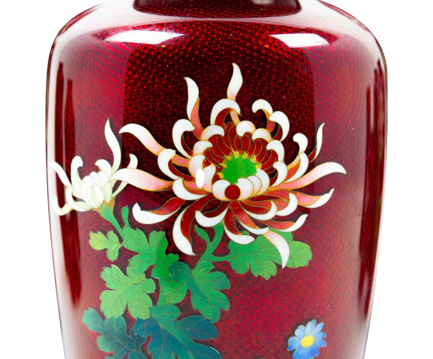 A Collection of Thirteen Japanese Red Ground Cloisonné Articles
