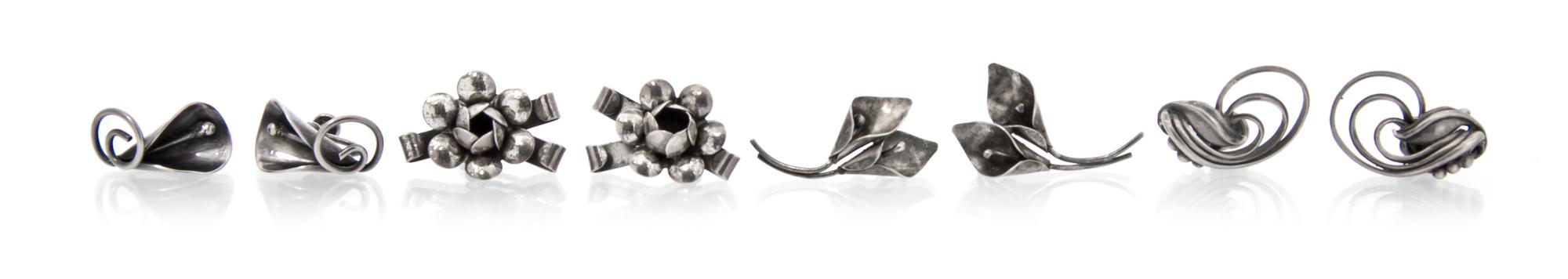 A Collection of Sterling Silver Earclips, 17.60 dwts.