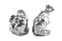 A Pair of Italian Silver-Plate Monkey Figures, Mid-20th Century, each in the form of a seated monkey, one figure holding an umbrella an