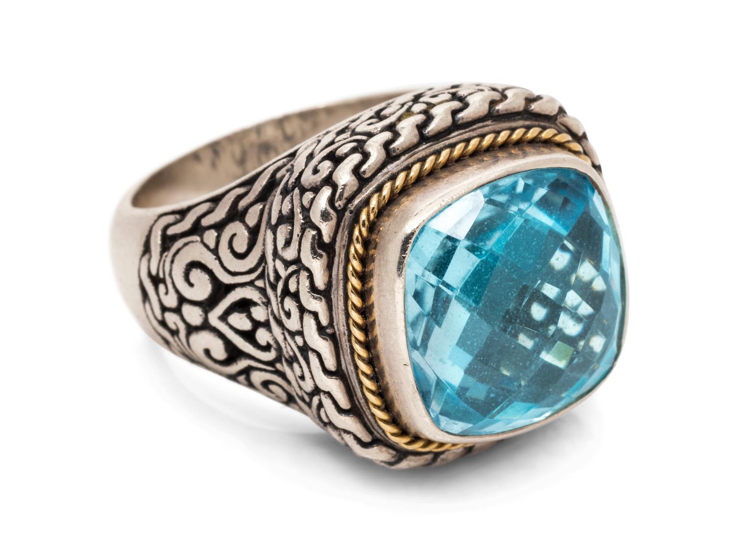 A Sterling Silver, 18 Karat Yellow Gold, and Blue Topaz Ring, Effy,
