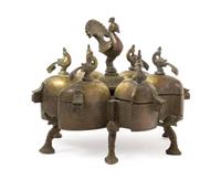 An Indian Bronze Spice Box Diameter 5 1/4 x height 4 inches.