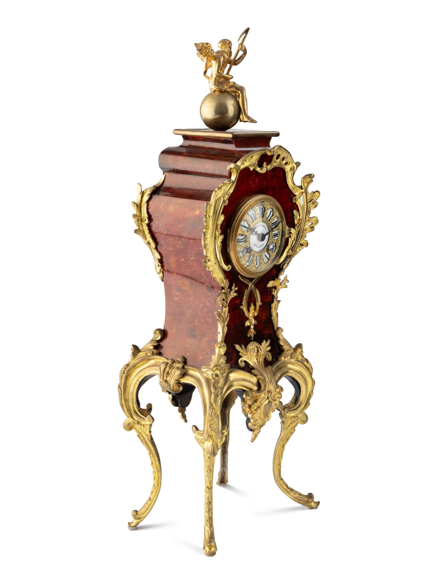 A Louis XV Style Gilt Metal and Faux Tortoise Shell Mantel Clock