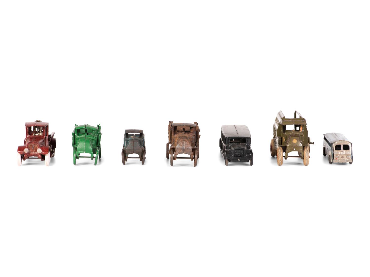 Seven Painted Cast Iron Toy Vehicles