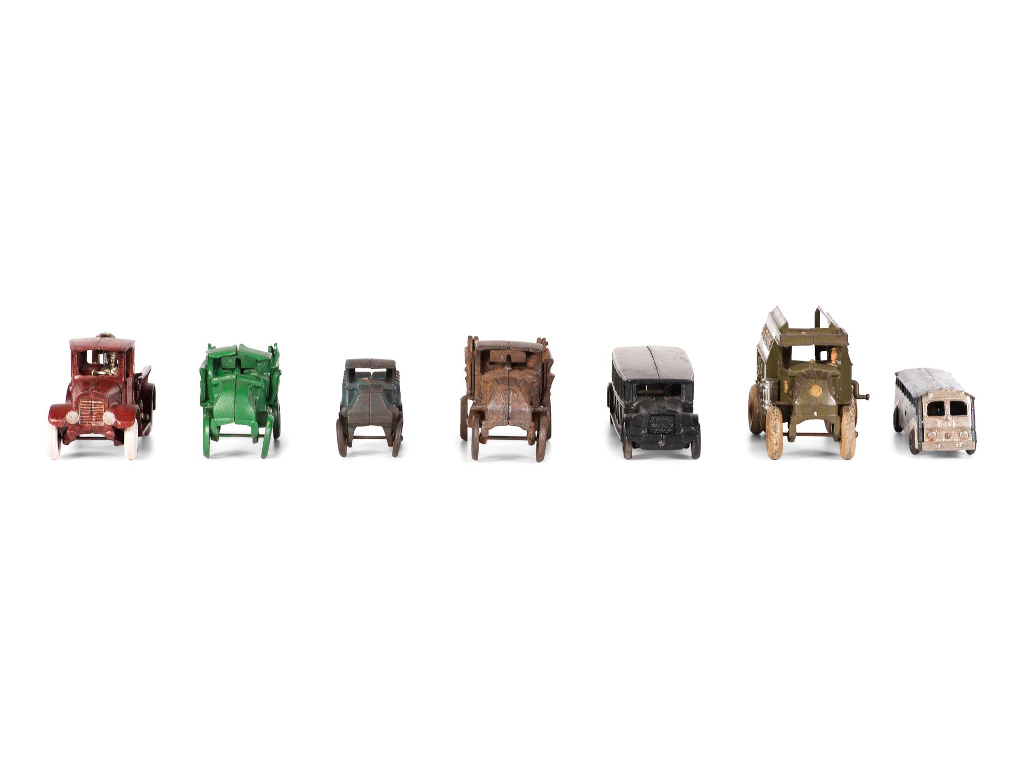 Seven Painted Cast Iron Toy Vehicles