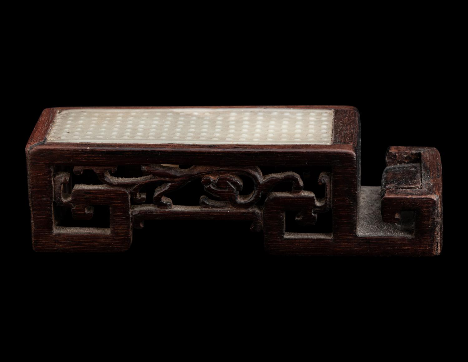 A Chinese Celadon Jade Sword Fitting Mounted as Ink-Cake Stand