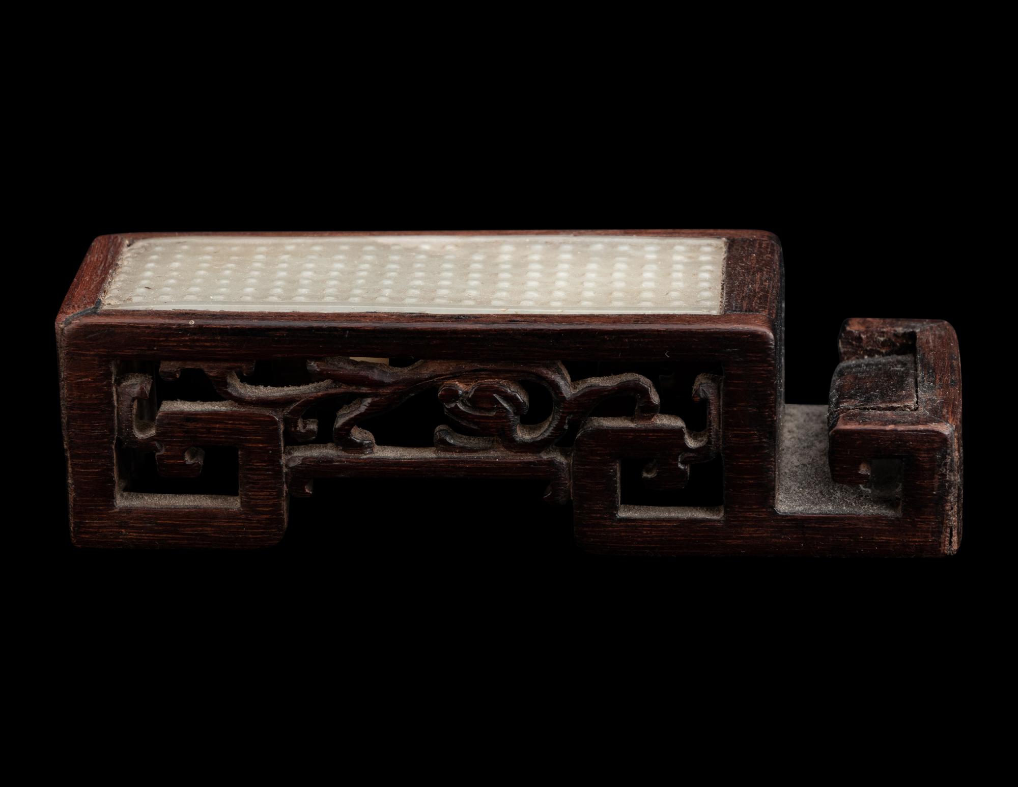A Chinese Celadon Jade Sword Fitting Mounted as Ink-Cake Stand