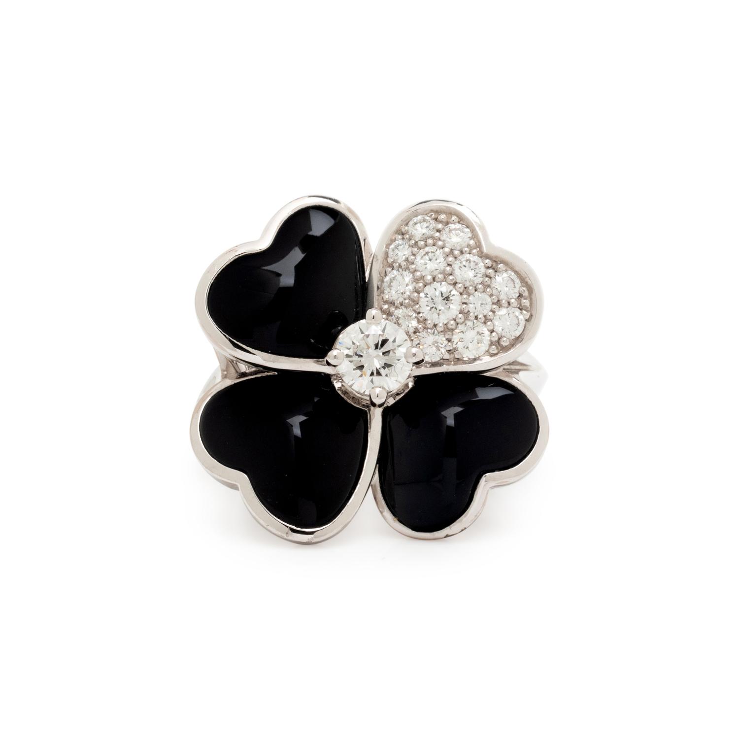 VAN CLEEF & ARPELS, DIAMOND, ONYX AND WHITE GOLD 'COSMOS' RING